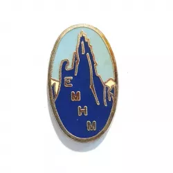 Insigne École Militaire de Haute Montagne, de forme ovale, représentant le sommet d'une montagne bleu, titré "EMHM".