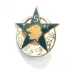 Insigne en forme d'étoile et de lune, représente une tête de lion accompagné d'écritures arabes et du titre "5TM".