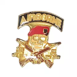 Pin's "AIRBORNE", tête de mort vêtue d'un béret et muni de fusils croisés.
En métal avec les couleurs rouge, or, brun et noir.