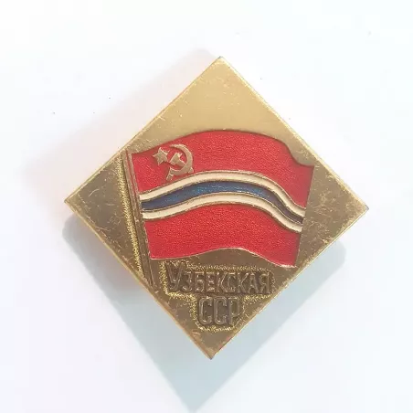 Pin's losange en or, rouge, blanc et bleu, drapeau de l'Ouzbékistan du temps de l'URRS avec l'inscription "Узбекская ССР".
