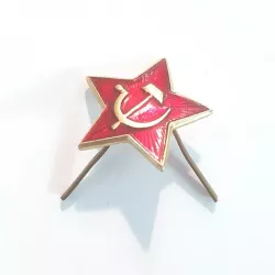 Petite étoile en métal avec attache pliable, en rouge et or, avec les symboles de l'URSS (faucille et marteau).