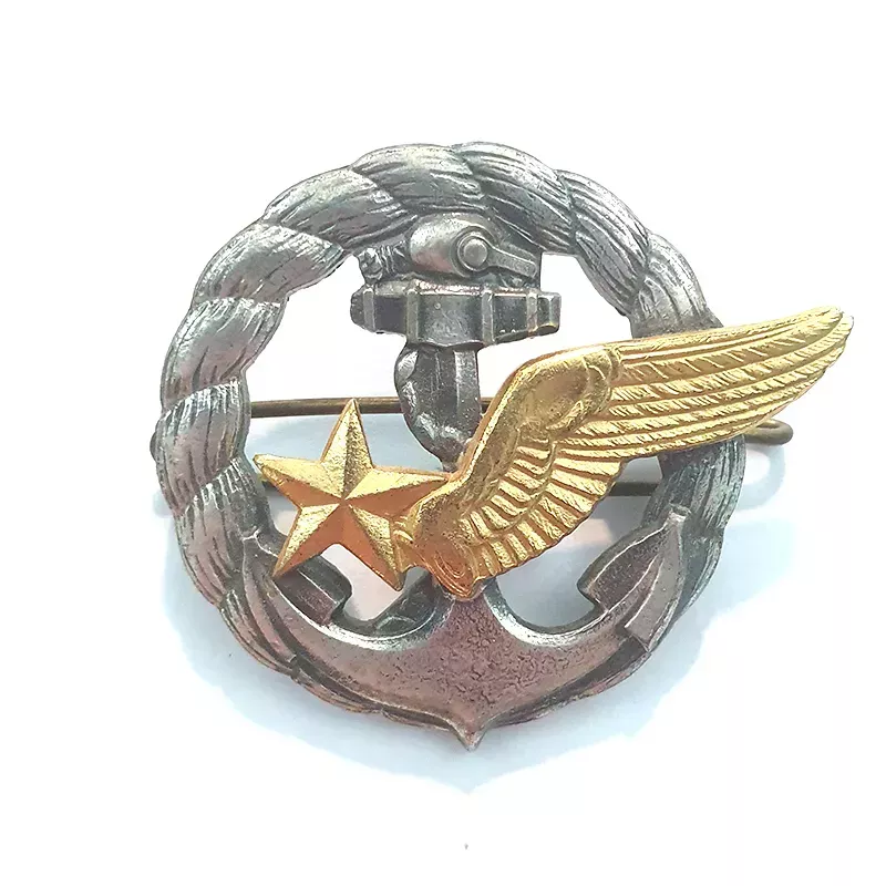 Brevet d'Élève Pilote Aéronvale, illustré d'une étoile ailée, placé sur une encre et entourée d'une corde.