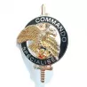 Brevet Commando Spécialisé du 1e BPC. Illustré par un aigle sur une rondache décorée de la France, d'un parachute et d'une épée.